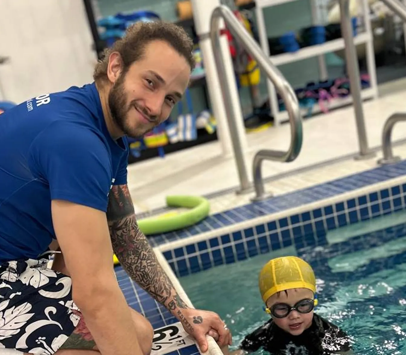 Young swimmer practicing swimming independently without instructor support at Marina’s Swim School.