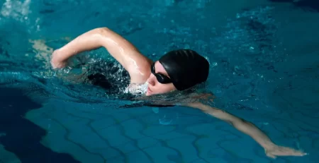 medium-shot-athlete-swimming-pool